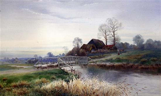 Thomas Noel Smith (19th/20th century) Rural landscape with sheep crossing a river on a bridge and farm buildings 15 x 24.5in.